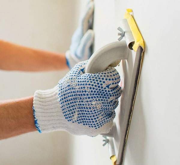 Spatola per intonaco